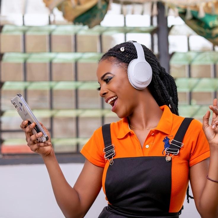 Priya Malhotra, Lead Design Curator at Mirror Light House Way, reviewing corporate floral arrangements